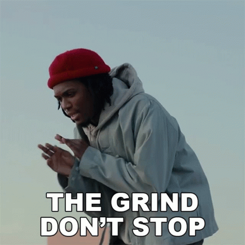 A Man Wearing A Red Hat And A Grey Jacket Says " The Grind Do N't Stop " GIF