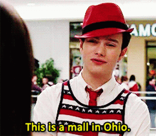 A Man Wearing A Red Hat And A Vest Says This Is A Mall In Ohio GIF