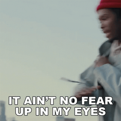 A Man Wearing A Red Hat Is Saying It Ain 'T No Fear Up In My Eyes GIF