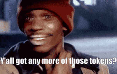 A Man Wearing A Red Hat Is Smiling And Asking If He Has Any More Tokens GIF