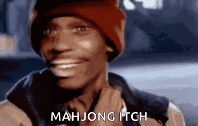 A Man Wearing A Red Hat Is Smiling And Says Mah Jong Itch . GIF