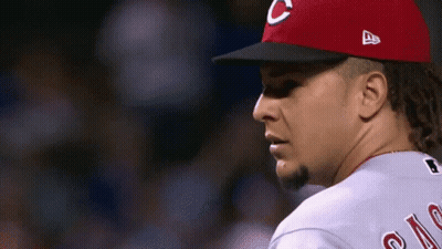 A Man Wearing A Red Hat With A C On It GIF
