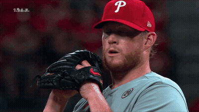A Man Wearing A Red Hat With A Letter P On It GIF