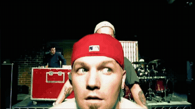 A Man Wearing A Red Hat With The Letters Mlb On It GIF