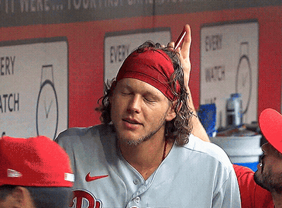A Man Wearing A Red Headband And A Nike Jersey GIF