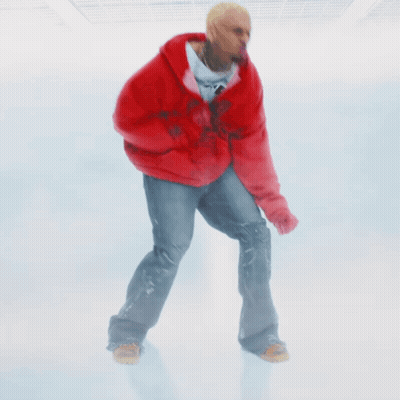 A Man Wearing A Red Hoodie And Jeans Is Standing On A White Background GIF