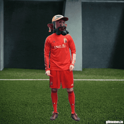 A Man Wearing A Red Ing Jersey Is Dancing On A Soccer Field GIF