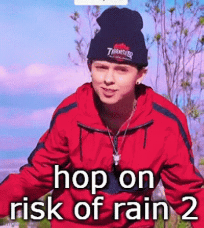 A Man Wearing A Red Jacket And A Thrasher Hat Is Standing In The Rain . GIF