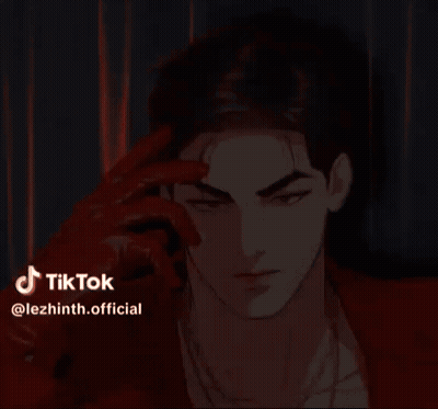 A Man Wearing A Red Jacket And Red Gloves Is Looking At The Camera . GIF