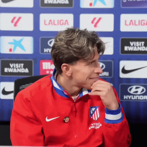 A Man Wearing A Red Jacket With The Word Laliga On It GIF