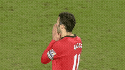 A Man Wearing A Red Jersey With Gg On The Back GIF