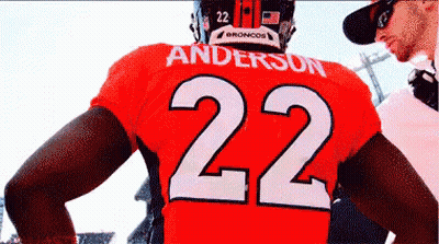 A Man Wearing A Red Jersey With The Name Anderson On It GIF