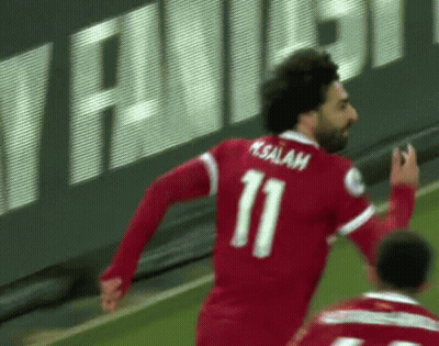 A Man Wearing A Red Jersey With The Number 11 On It GIF
