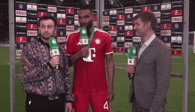 A Man Wearing A Red Jersey With The Number 4 On It GIF