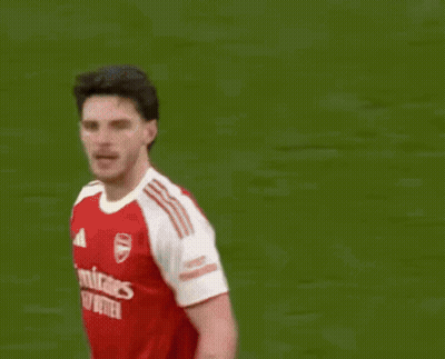 A Man Wearing A Red Jersey With The Number 41 On It GIF