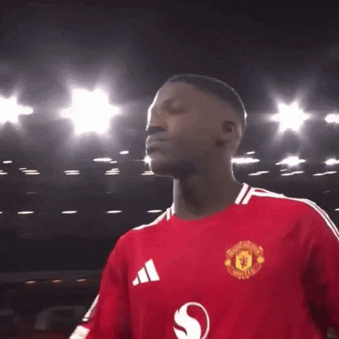 A Man Wearing A Red Manchester United Shirt GIF