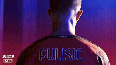 A Man Wearing A Red Milan Shirt With The Name Pulisic On The Back GIF