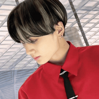 A Man Wearing A Red Shirt And A Black Tie GIF