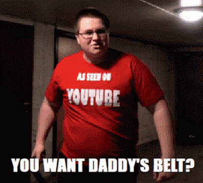 A Man Wearing A Red Shirt That Says " As Seen On Youtube You Want Daddy 'S Belt " GIF
