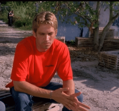 A Man Wearing A Red Shirt That Says Columbia On It GIF