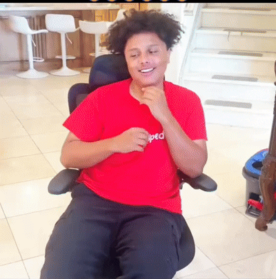 A Man Wearing A Red Shirt That Says Iped GIF