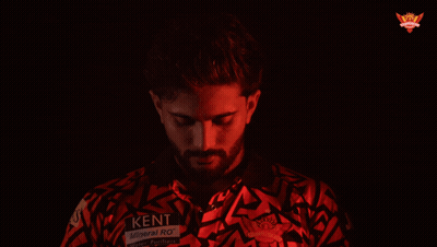 A Man Wearing A Red Shirt That Says Ken GIF