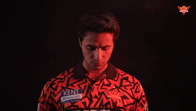 A Man Wearing A Red Shirt That Says Kent Mineral Ro GIF