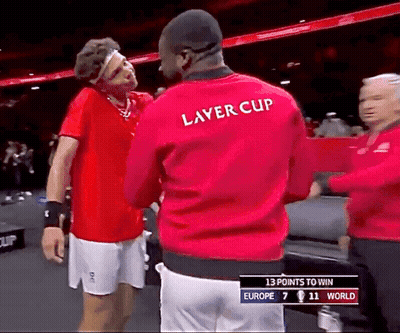 A Man Wearing A Red Shirt That Says Laver Cup On It GIF