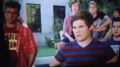 A Man Wearing A Red Shirt That Says ' Rumble Ep ' On It GIF