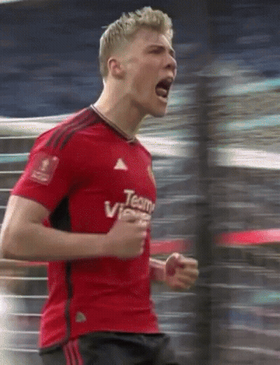 A Man Wearing A Red Shirt That Says Team Vi GIF