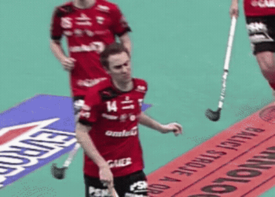 A Man Wearing A Red Shirt With The Number 14 On It GIF