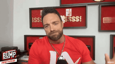 A Man Wearing A Red Shirt With The Word Bump On The Bottom GIF