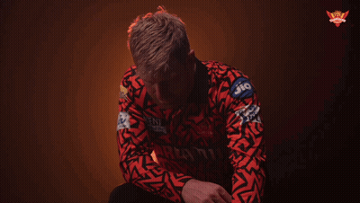 A Man Wearing A Red Shirt With The Word Knock On The Bottom GIF