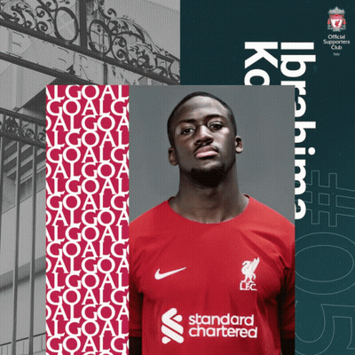 A Man Wearing A Red Shirt With The Word Standard Chartered On It GIF