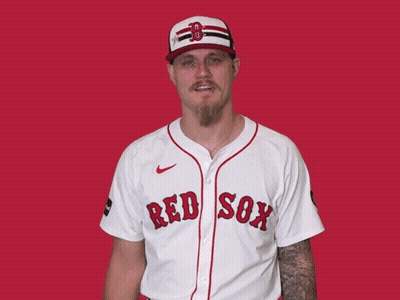 A Man Wearing A Red Sox Jersey Is Smiling GIF