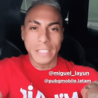 A Man Wearing A Red T-Shirt With The Name Miguel Layun On It GIF
