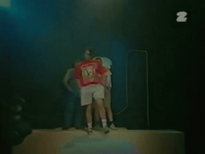A Man Wearing A Red T-Shirt With The Word Cincinnati On It GIF