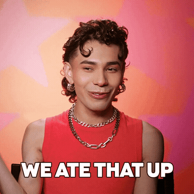A Man Wearing A Red Tank Top And A Chain Around His Neck Says We Ate That Up GIF