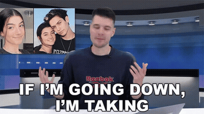 A Man Wearing A Reebok Sweatshirt Says " If I 'M Going Down , I 'M Taking " GIF