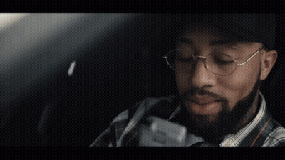 A Man Wearing A San Francisco Hat And Glasses GIF