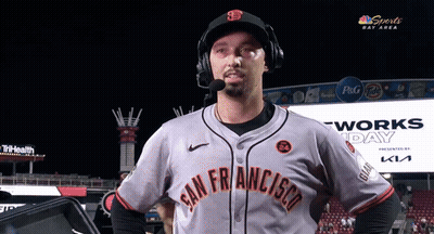 A Man Wearing A San Francisco Jersey With A Microphone GIF