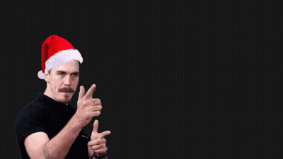 A Man Wearing A Santa Hat And A Shirt That Says Coach On It GIF
