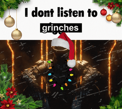 A Man Wearing A Santa Hat Is Surrounded By Christmas Decorations And Says " I Dont Listen To Grinches " GIF