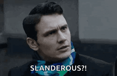 A Man Wearing A Scarf Around His Neck Is Making A Funny Face And Says Slanderous . GIF