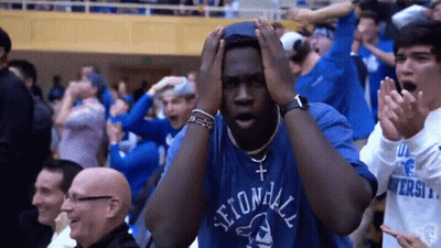 A Man Wearing A Second Hill Shirt Holds His Hands To His Head GIF