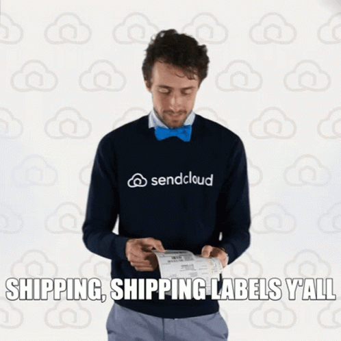 A Man Wearing A Sendcloud Sweater Looks At A Shipping Label GIF