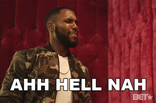 A Man Wearing A Sequined Jacket Is Laughing And Says Ahh Hell Nah GIF