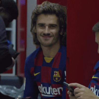 A Man Wearing A Shirt That Says Akuter On It Smiles GIF