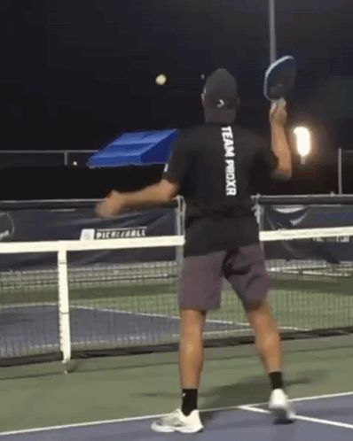 A Man Wearing A Shirt That Says ' All Proxxer ' On The Back GIF
