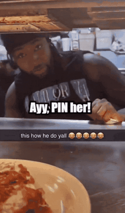 A Man Wearing A Shirt That Says Ayy Pin Her Is Looking At A Plate Of Food GIF